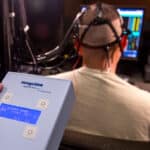 Electrodes administer transcranial direct current stimulation while sensors record oxygen levels in a test subject's brain as he performs a multitasking cognitive test in the Non-Invasive Brain Stimulation lab at the Air Force Research Laboratory, Wright Patterson Air Force Base, Ohio, July 19, 2016.