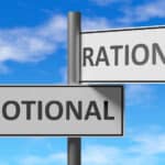 Image of a street sign that points one direction for "emotional" and the other direction for "rational" illustrating the tug of war behind rational addiction.