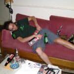 man passed out on the couch drunk