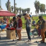 People performing outside in Venice Beach.