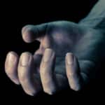 Photo of Upturned Human Hand Portrait View in a gesture of craving.