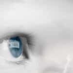 Photo of an eye and a cloud blended together, symbolic of cloudy vision and vision loss.