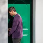 Photo of a person in drug rehab entering his room, showing the relationship between housing and addiction recovery.