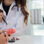 Photo of researchers targeting the medial habenula for addiction treatment.