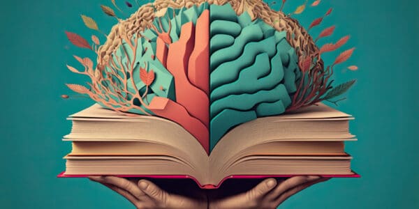 Illustration of a brain growing up out of a book, almost like a brain map.