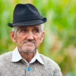 Photo of an elderly man wearing a sweater.