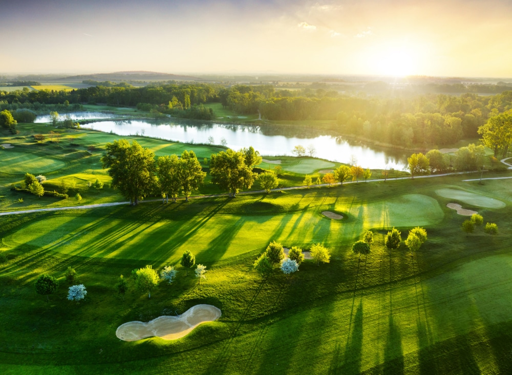 Arial photograph of a mountain resort near a golf course similar to Caron Addiction Treatment Center's campus.