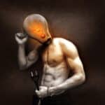 An image of a man with a light bulb for his head, pictured standing and holding a plug.