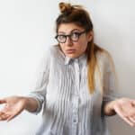 Half-length photograph of a woman with an expression of surprise at learning GLP-1 drugs aren't the answer to overweight.