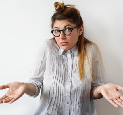 Half-length photograph of a woman with an expression of surprise at learning GLP-1 drugs aren't the answer to overweight.