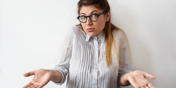 Half-length photograph of a woman with an expression of surprise at learning GLP-1 drugs aren't the answer to overweight.
