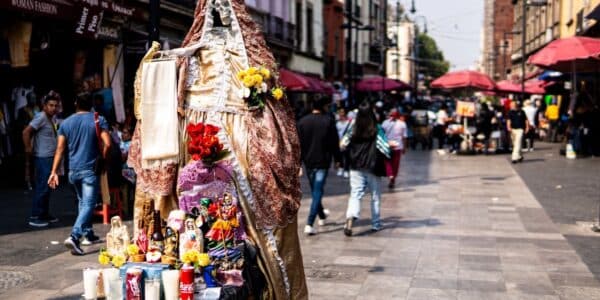 A street shrine with a statue of Santa Muerte.