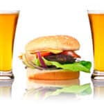 photograph of junk food between two beers.