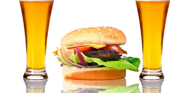 photograph of junk food between two beers.