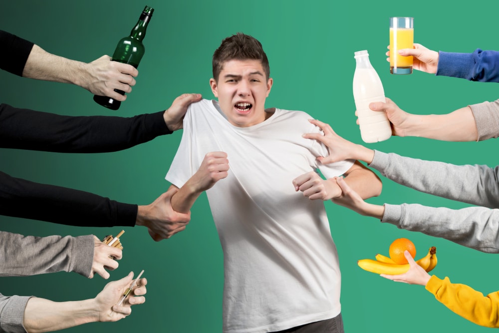 Photo of a teenager being pulled in different directions, by alcohol, tobacco, and drugs on one side and by healthy foods and drinks on the other side.