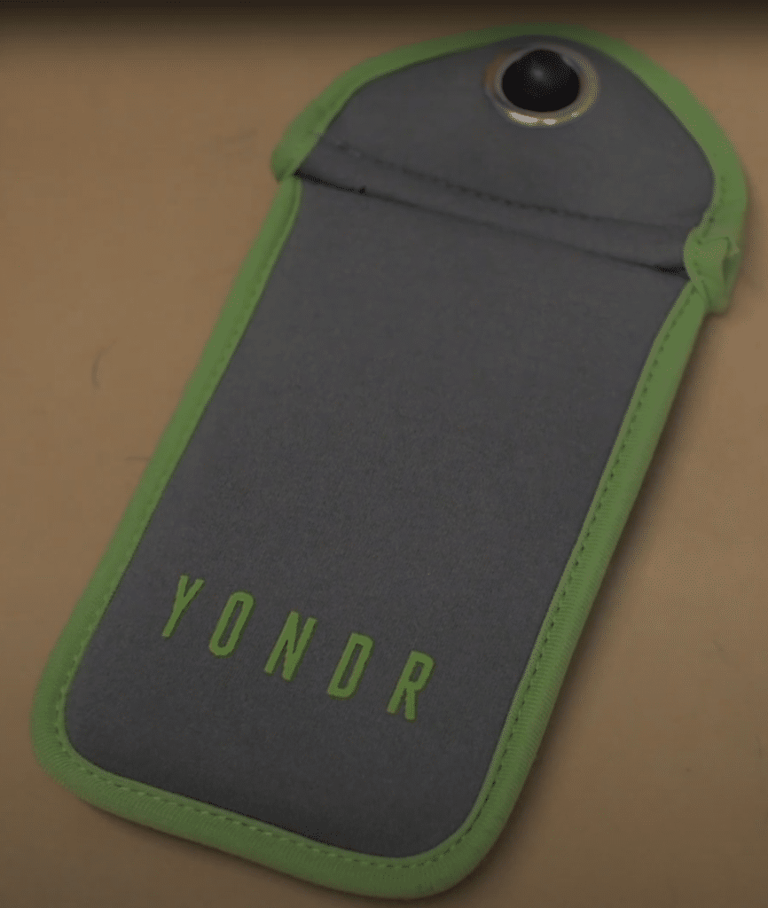 Photograph of a Yondr lockable phone pouch.