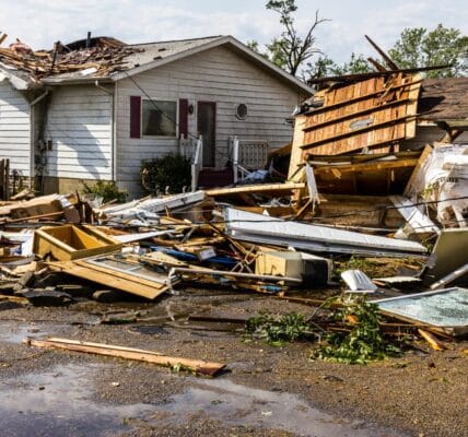 An image of a tornado-damaged home.