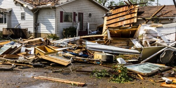An image of a tornado-damaged home.