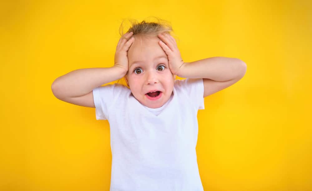 Photo of a child with a stressed expression.