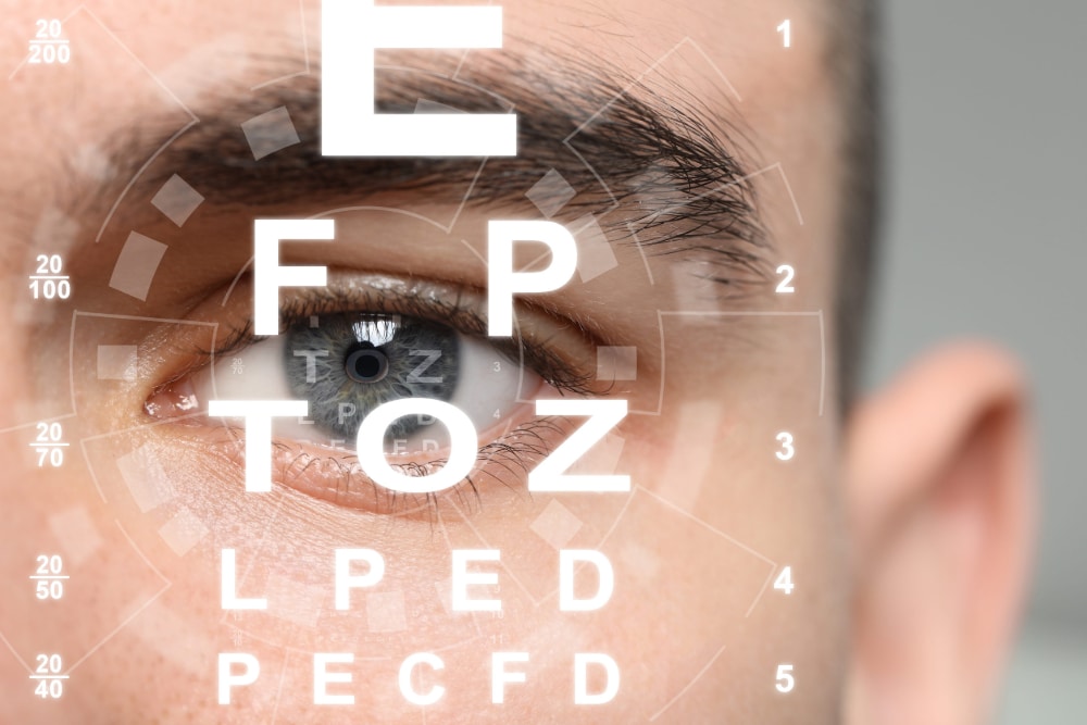 Photo of a woman's eye superimposed with an eye chart.