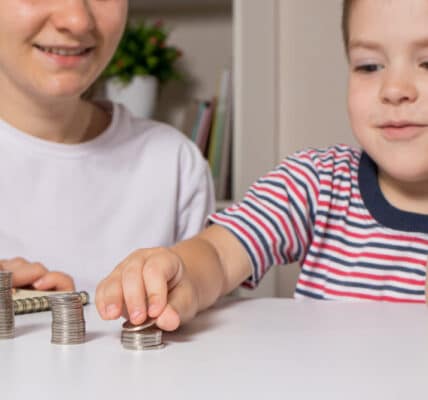Photo of a woman teaching a child how to gamble.
