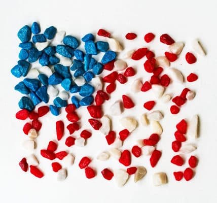 American flag made up of red, white and blue pebbles.