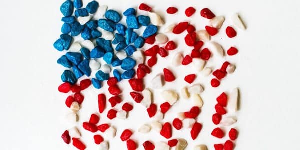American flag made up of red, white and blue pebbles.