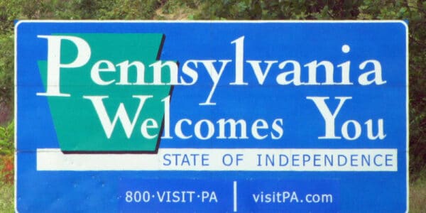 Photograph of "Pennsylvania Welcomes You" road sign.